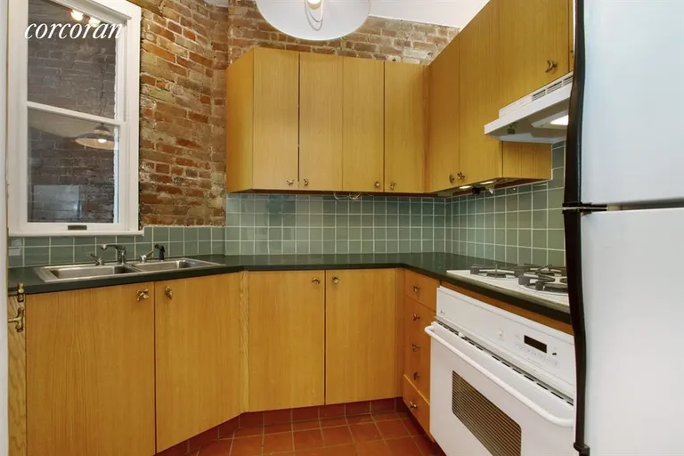 New York City Real Estate | View 225 East 4th Street, 20 | Large windowed kitchen | View 2