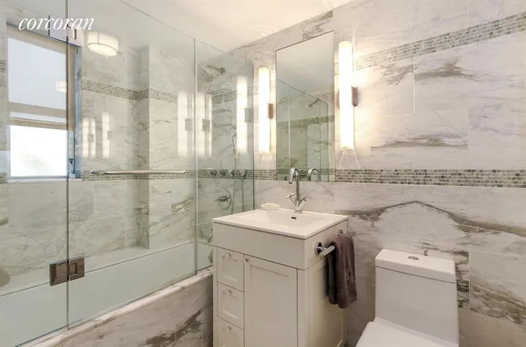 New York City Real Estate | View 333 East 43rd Street, 403 | Renovated Windowed Bathroom | View 4