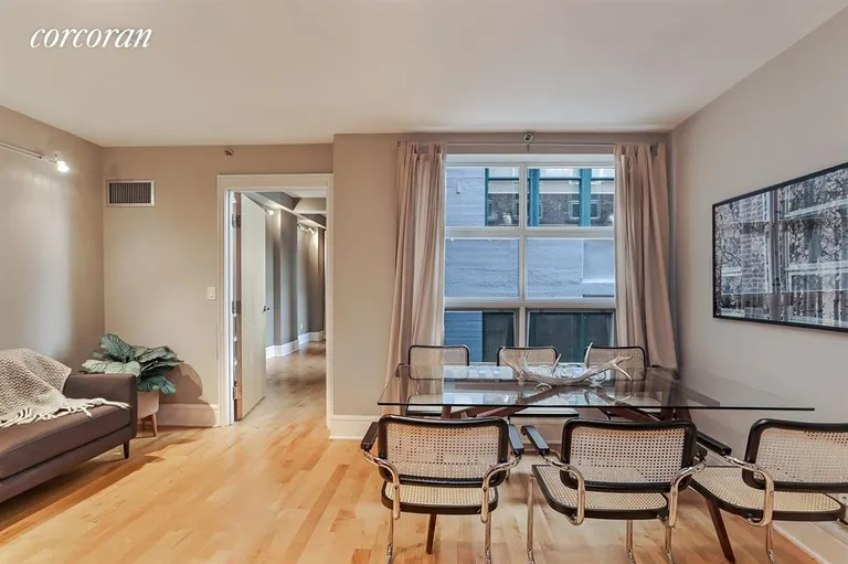 New York City Real Estate | View 57 Front Street, 405 | Windowed Dining Room | View 2