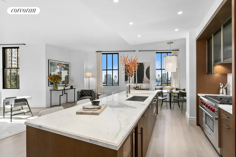 New York City Real Estate | View 100 Barclay Street, 12Q | Kitchen and Den beyond | View 2