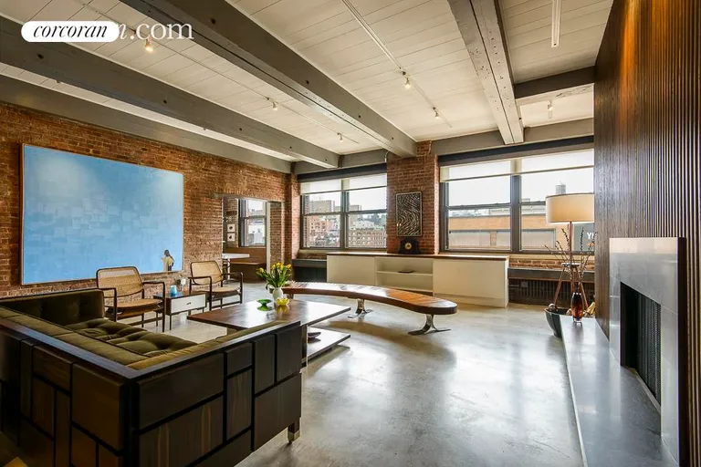 New York City Real Estate | View 525 West 22nd Street, 5D | Open loft with woodburning fireplace | View 3