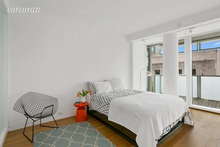 New York City Real Estate | View 1 Grand Army Plaza, 6K | Bedroom with views of the Brooklyn Library | View 4