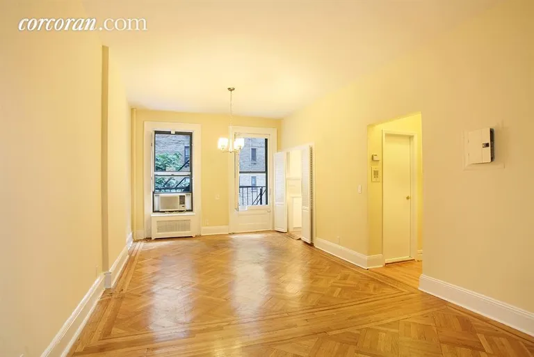 New York City Real Estate | View 232 East 58th Street, 3 FL | Living Room - Southern Exposure and Dining Area | View 4