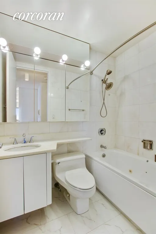 New York City Real Estate | View 161 West 61st Street, 12C | Marble Bathroom | View 4