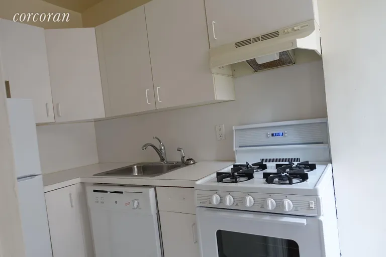 New York City Real Estate | View 162 West 56th Street, 1506 | windowed kitchen | View 4