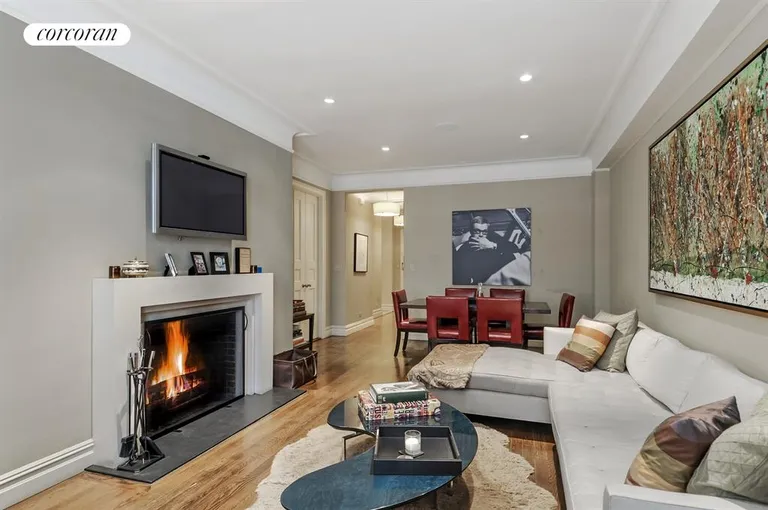 New York City Real Estate | View 50 West 67th Street, 5C | Living Room with Wood Burning Fireplace | View 2