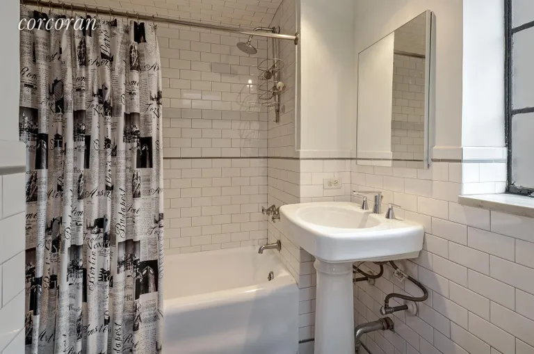 New York City Real Estate | View 25 Tudor City Place, 1120 | Bathroom (Windowed, South View) | View 5