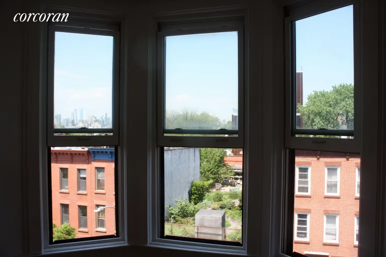 New York City Real Estate | View 396 12th Street, 4R | Manhattan skyline view from bay window. | View 3