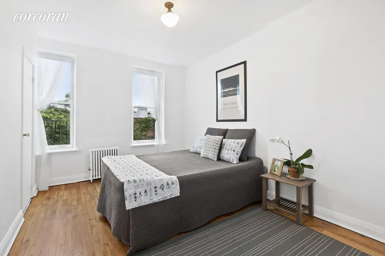 New York City Real Estate | View 396 12th Street, 4R | The bedroom has a garden view.  | View 2
