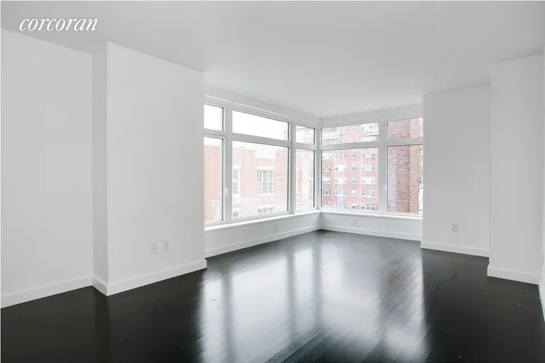New York City Real Estate | View 400 East 67th Street, 6J | Large corner living room | View 5