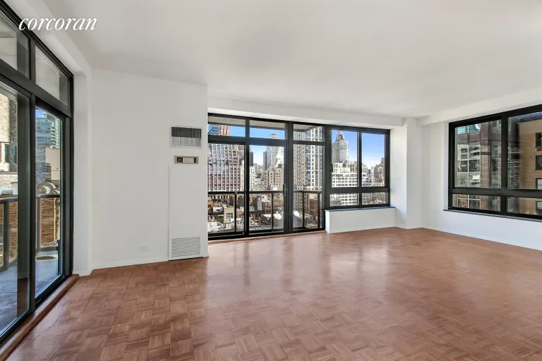 New York City Real Estate | View 100 United Nations Plaza, 15G | Living Room with Private Wrap Balcony | View 2