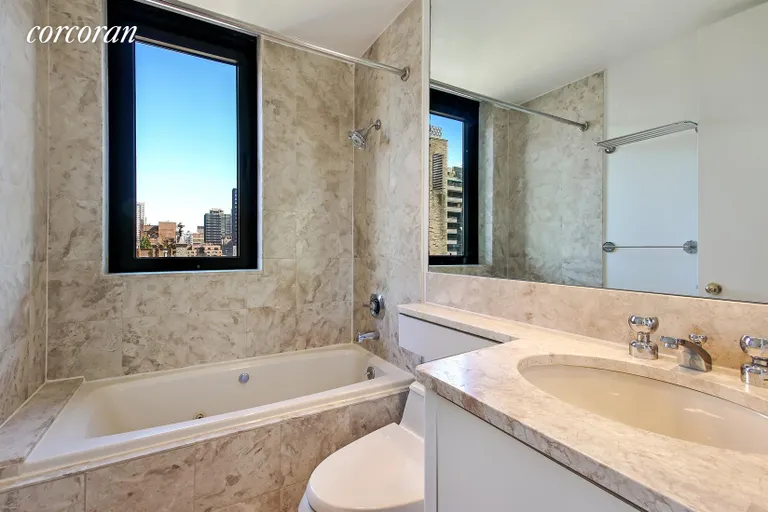 New York City Real Estate | View 100 United Nations Plaza, 15G | Windowed Ensuite Master Bathroom | View 5