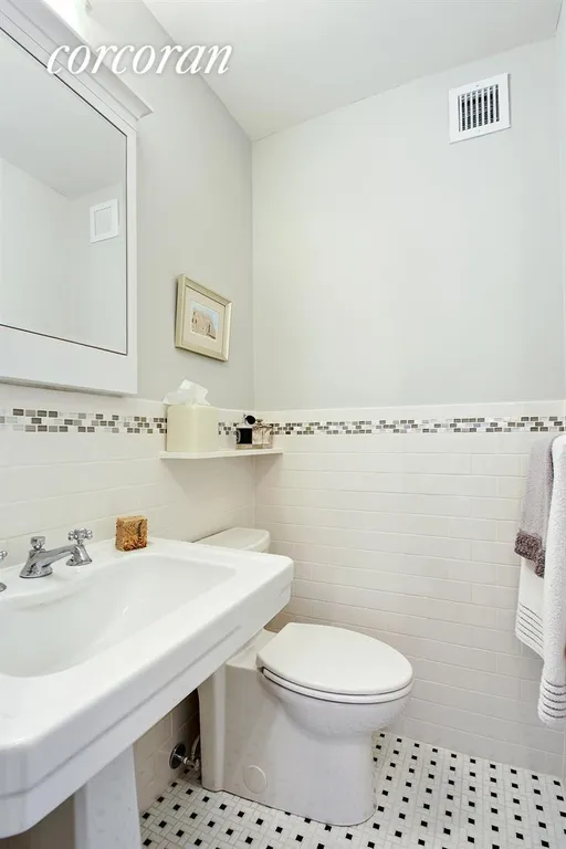 New York City Real Estate | View 400 East 56th Street, 20C | Charming Modern Half Bath | View 7
