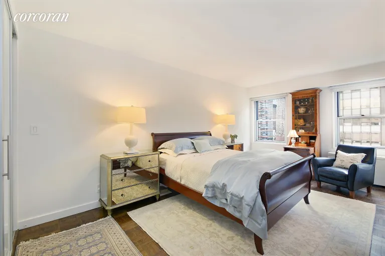 New York City Real Estate | View 400 East 56th Street, 20C | Large Bedroom with Beautiful Glass Closet Doors | View 5