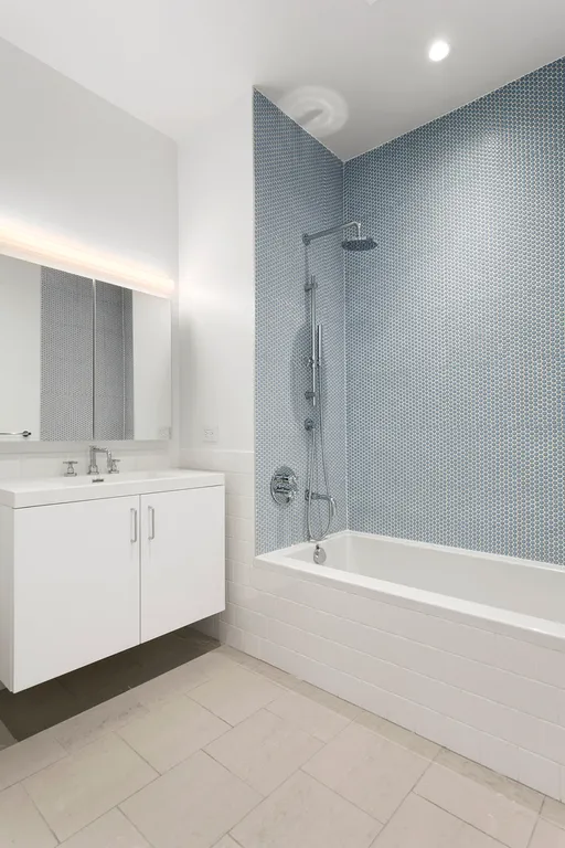 New York City Real Estate | View 57 Lispenard Street, 2 | Second bathroom with tub and shower | View 8