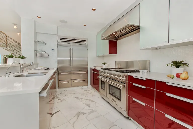 New York City Real Estate | View 300 East 77th Street, 27/28B | Windowed Kitchen | View 5