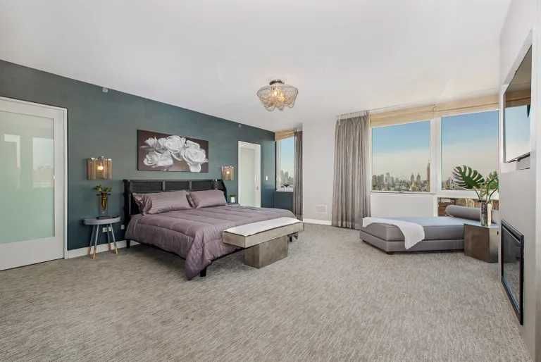 New York City Real Estate | View 300 East 77th Street, 27/28B | Master Bedroom Suite | View 8