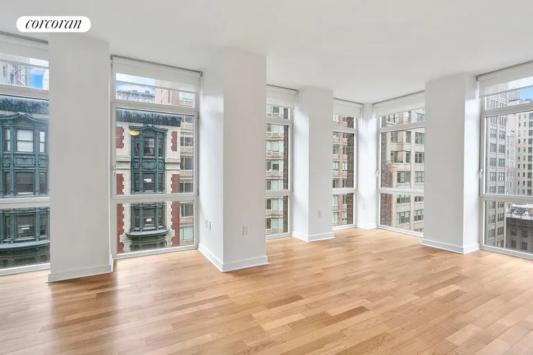 New York City Real Estate | View 11 East 29th Street, 10A | Double exposure living room & den | View 3