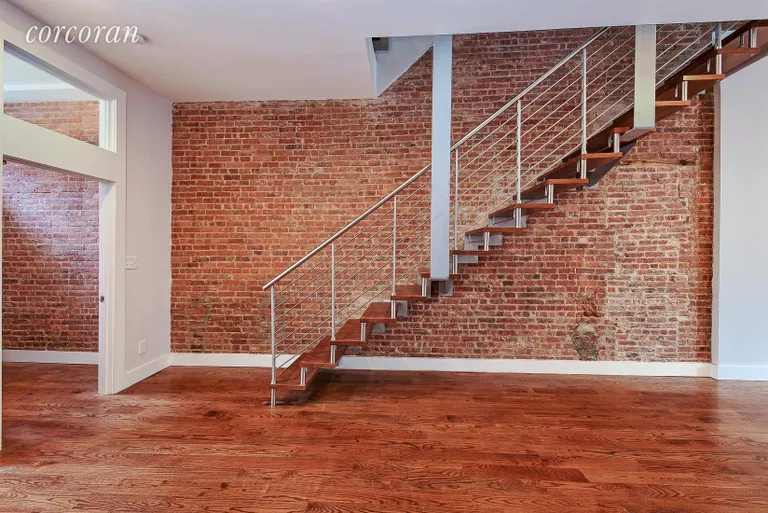 New York City Real Estate | View 213 West 131st Street | Staircase triplex apartment | View 4