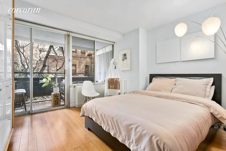 New York City Real Estate | View 142 East 16th Street, 2G | Serene spacious bedroom pours into the terrace. | View 3