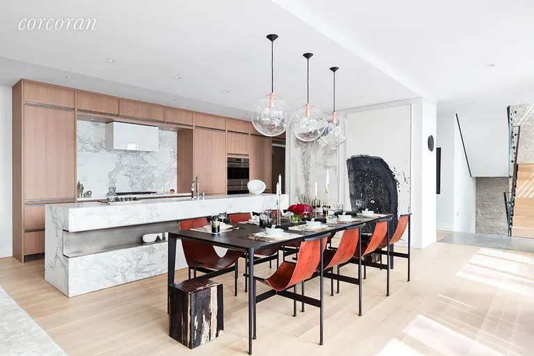 New York City Real Estate | View 421 Hudson Street, TH1 | Open kitchen with expansive windowed dining area | View 7