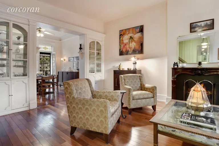 New York City Real Estate | View 225 Bergen Street | Living Room with Fire place and Built in Cabinets | View 3