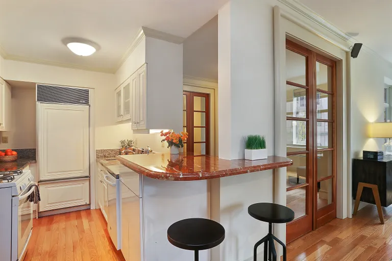 New York City Real Estate | View 22 West 66th Street, 2A | Open kitchen with breakfast bar | View 2