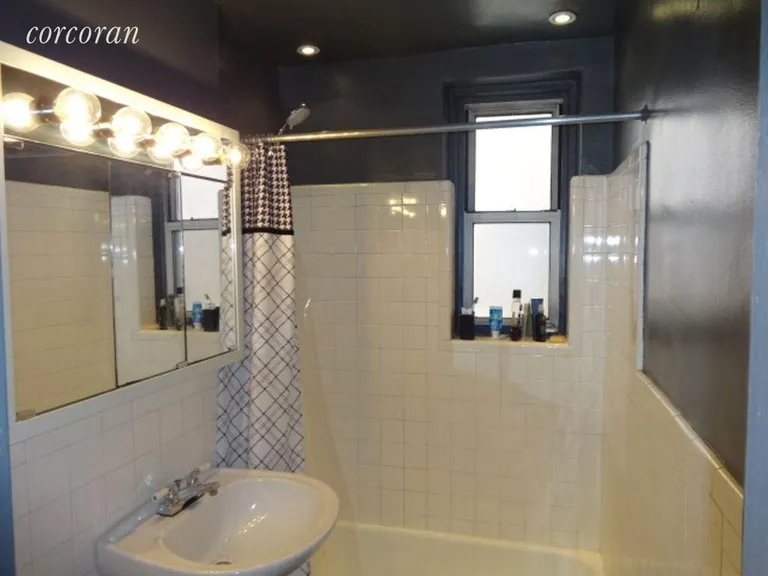 New York City Real Estate | View 2102 Holland Avenue, 1A | Tiled Bathroom with window | View 5