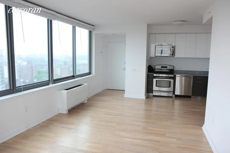 New York City Real Estate | View 230 Ashland Place, 24D | Kitchen open into the Living Room | View 3