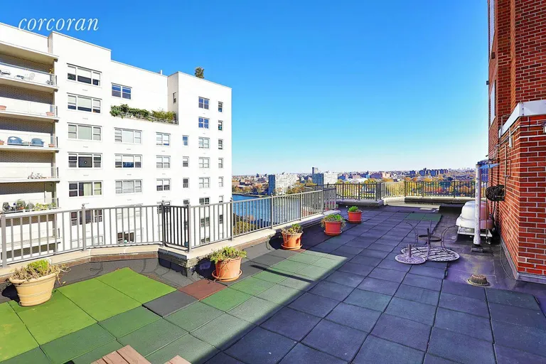 New York City Real Estate | View 520 East 76th Street, 9H | Roof Deck with East River Views | View 8