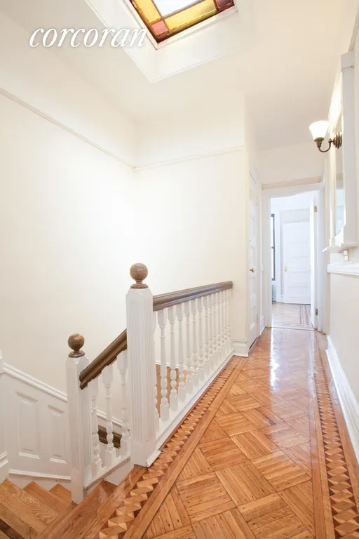New York City Real Estate | View 1174 Sterling Place, 2 | Hallway with stained-glass skylight  | View 10