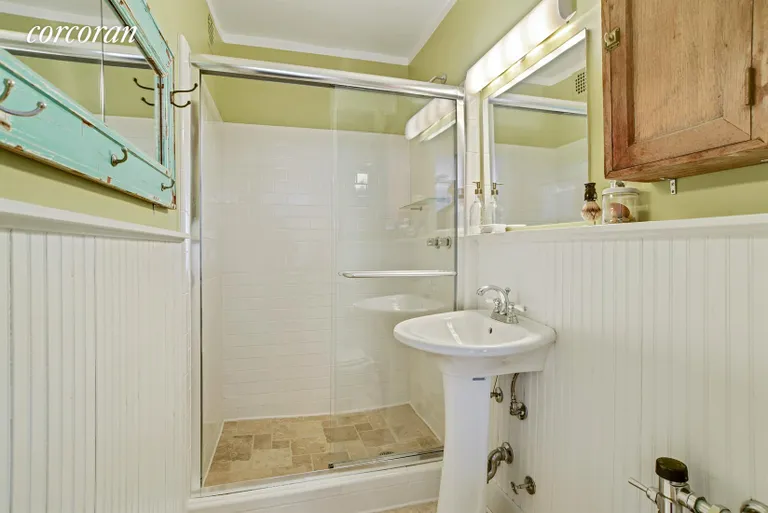 New York City Real Estate | View 616 East 18th Street, 4E | Walk in shower and wainscoting  | View 5