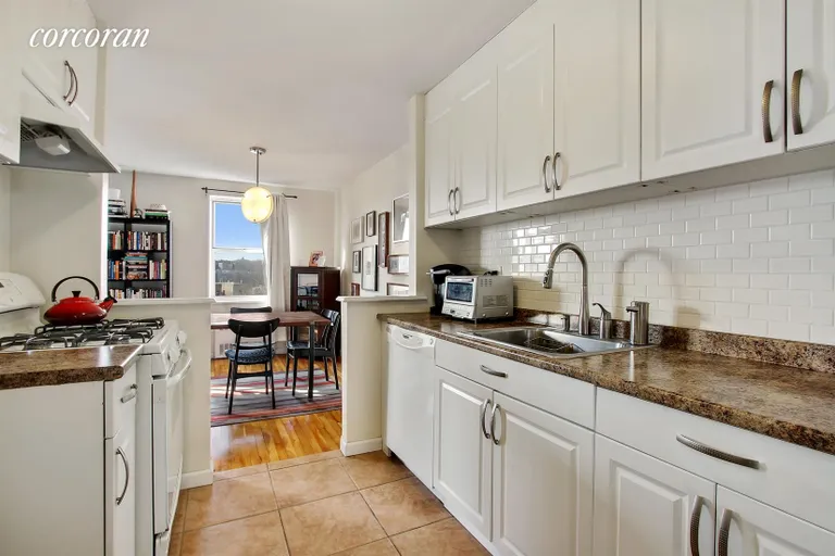 New York City Real Estate | View 75 West 238th Street, 4E | Open plan chef's kitchen with dishwasher/storage | View 2
