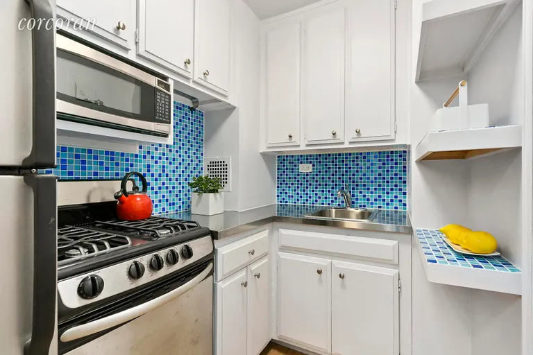 New York City Real Estate | View 77 East 12th Street, 17E | 4 Kitchen with 2 pantry closets | View 4