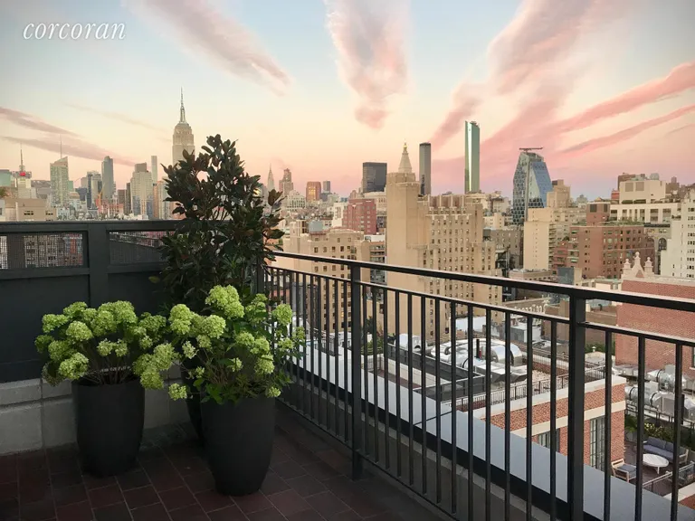 New York City Real Estate | View 155 West 11th Street, PH East | Iconic Midtown views from master bedroom terrace | View 2