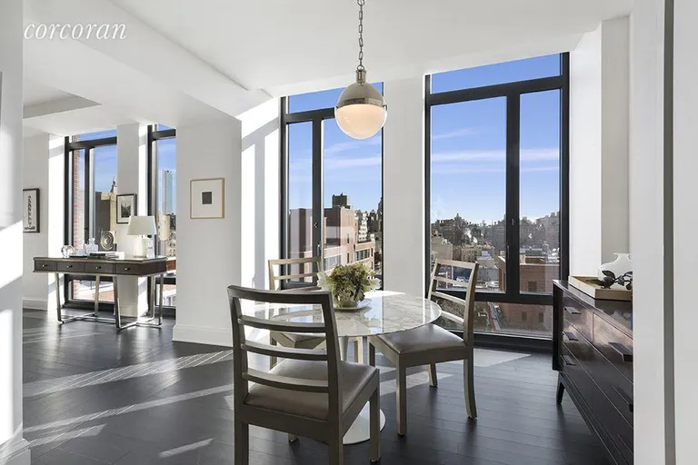 New York City Real Estate | View 155 West 11th Street, PH East | Eat-in kitchen with floor to ceiling windows | View 6