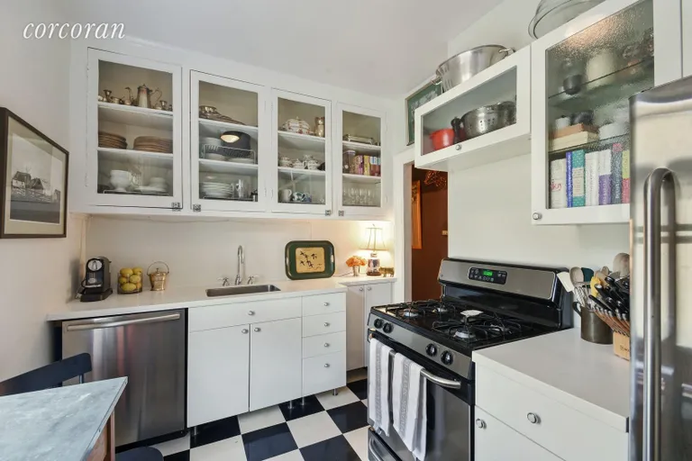 New York City Real Estate | View 264 6TH AVENUE, 4F | Original upper cabinets add charm & ample storage | View 3