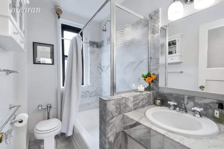 New York City Real Estate | View 264 6TH AVENUE, 4F | Jewel box marble bathroom with window | View 6