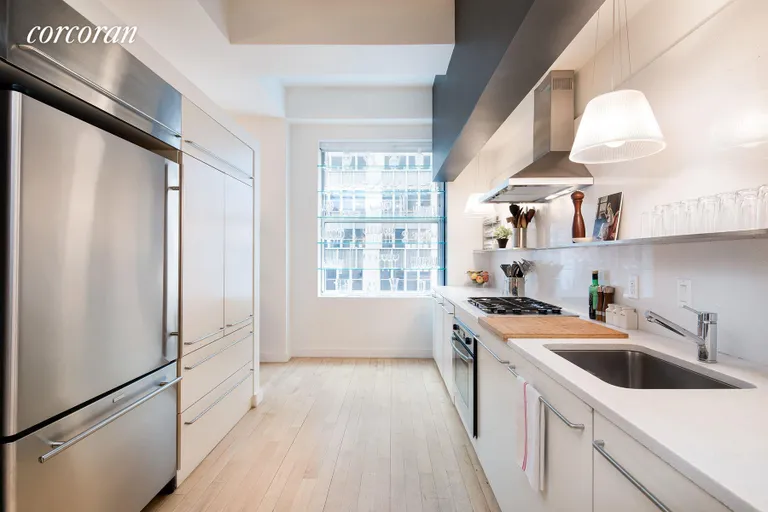 New York City Real Estate | View 15 Broad Street, 1720 | Large modern kitchen leads to living & dining area | View 3