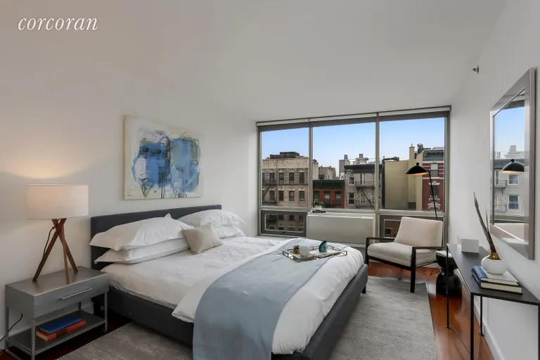New York City Real Estate | View 1 Avenue B, Penthouse C | Sun flooded master bedroom with ample closets | View 3