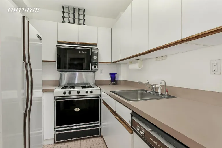 New York City Real Estate | View 245 East 50th Street, 7B | Kitchen with Great Counter Space and Storage | View 8
