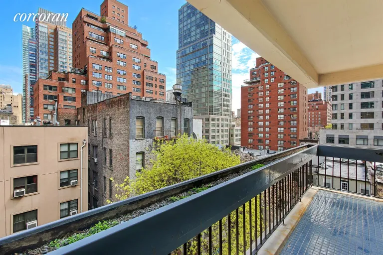 New York City Real Estate | View 245 East 50th Street, 7B | Large Balcony Overlooks Gardens and Blue Sky | View 4