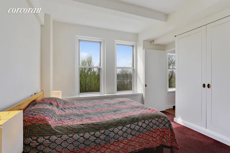 New York City Real Estate | View 310 Riverside Drive, 403 | Sunny Bedroom with West Facing Park Views | View 2