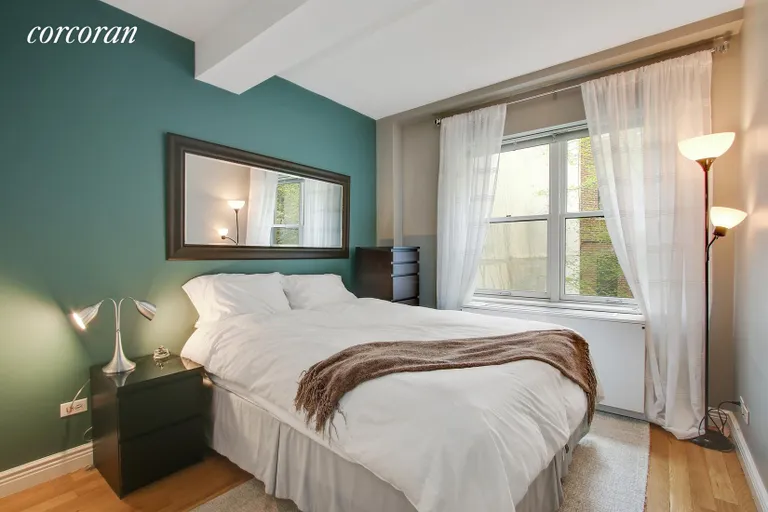 New York City Real Estate | View 435 East 76th Street, 2E | Private master bedroom with garden views | View 4