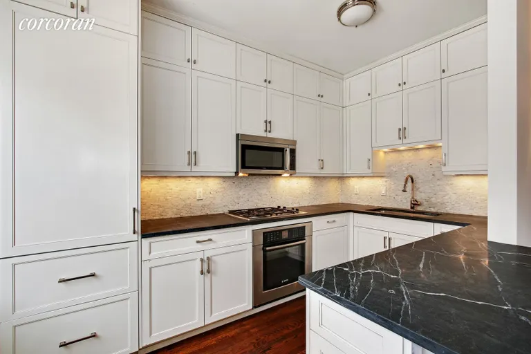New York City Real Estate | View 610 West 110th Street, 5B | Open custom kitchen with breakfast bar  | View 3