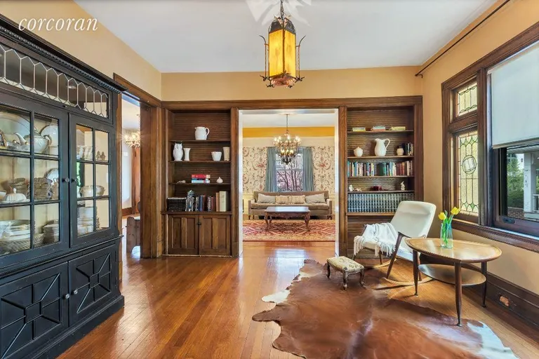 New York City Real Estate | View 237 77th Street | Dining Room with Beautiful Floors and Built-ins | View 5