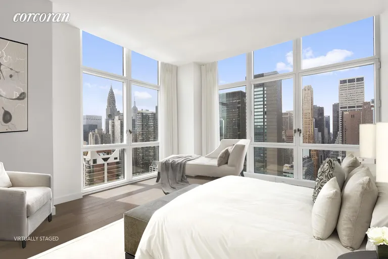 New York City Real Estate | View 305 East 51st Street, 30A | Master Bedroom virtually staged | View 3