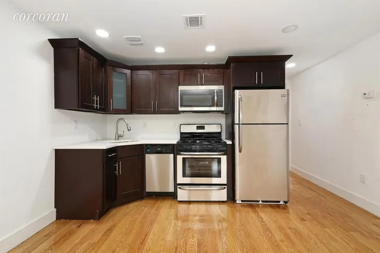 New York City Real Estate | View 148 West 9th Street | Kitchen with Full Sized Stainless Steel Appliances | View 3
