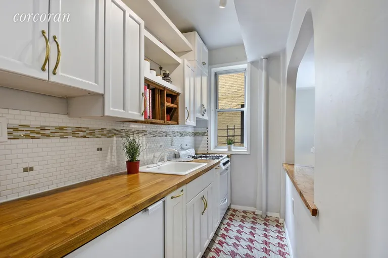 New York City Real Estate | View 125 Ocean Avenue, 5B | Open kitchen with breakfast bar | View 6