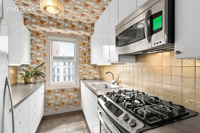 New York City Real Estate | View 2 Charlton Street, 8K | Renovated Windowed Kitchen | View 4